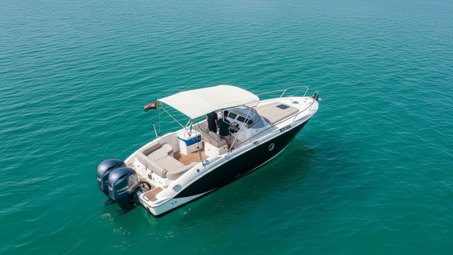 Aerial view of Sunrise Navigator 27 ft cruising Dubai waters